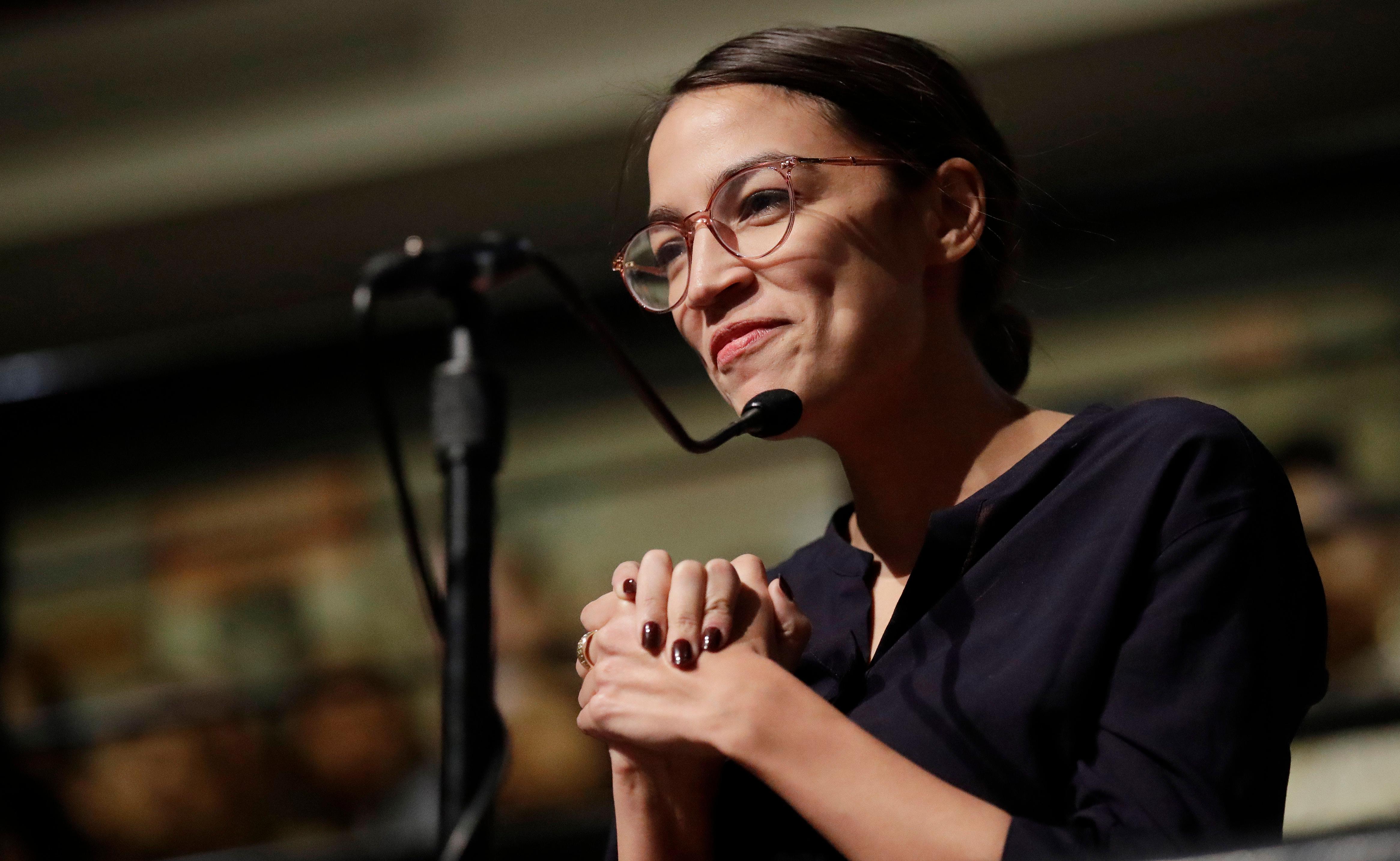 file: democrat alexandria ocasio-cortez asks 2014 nobel laureate
