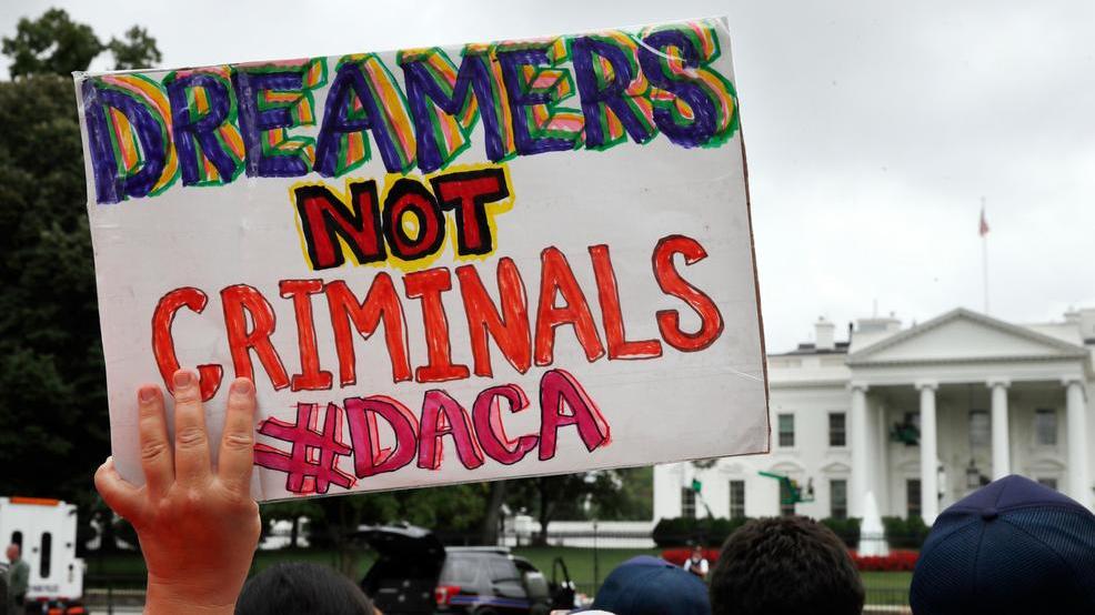 File Photo A Woman Holds Up A Signs In Support Of The Obama Administration Program Known As Deferred Action For Childhood Arrivals Or Daca File Photo A Woman Holds Up A Signs In Support Of The Obama Administration Program Known As Deferred Action For Childhood Arrivals Or Daca