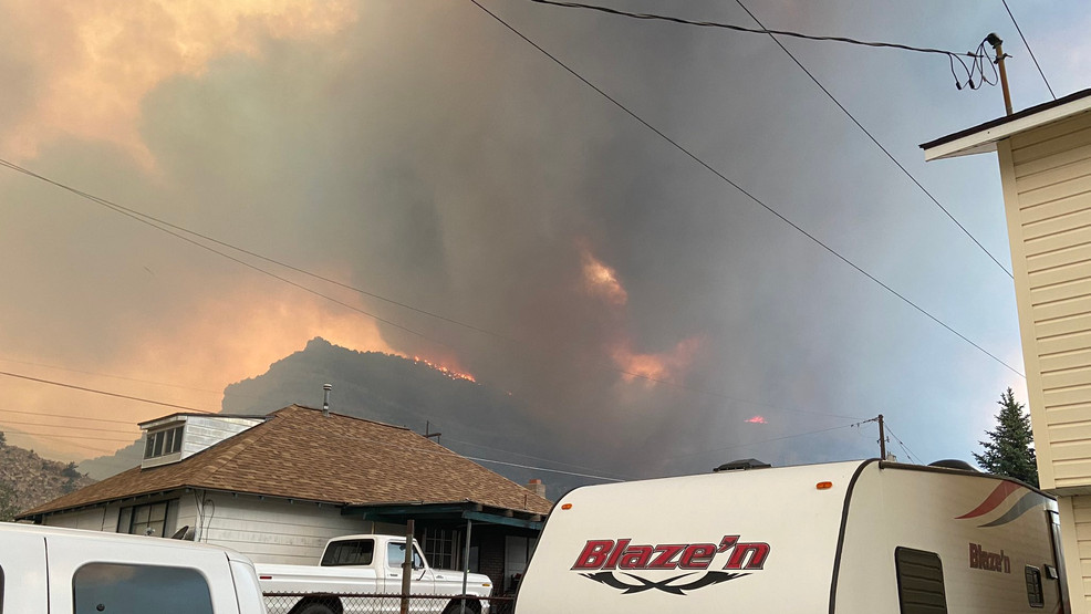 Firefighters set a line at US6 to stop Bear Fire burning near Helper