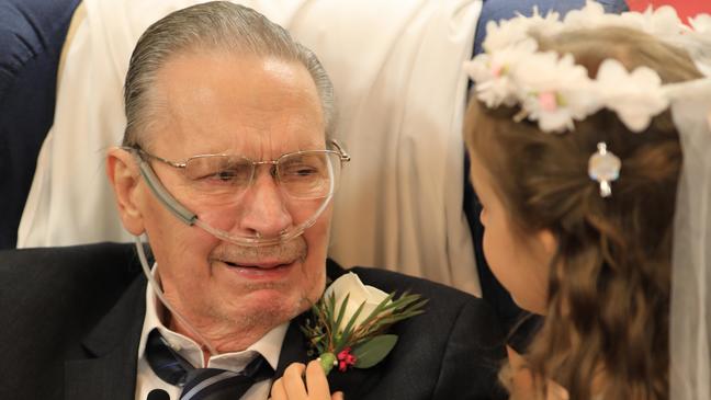 Guests smile through tears at bittersweet ceremony for Asheville family