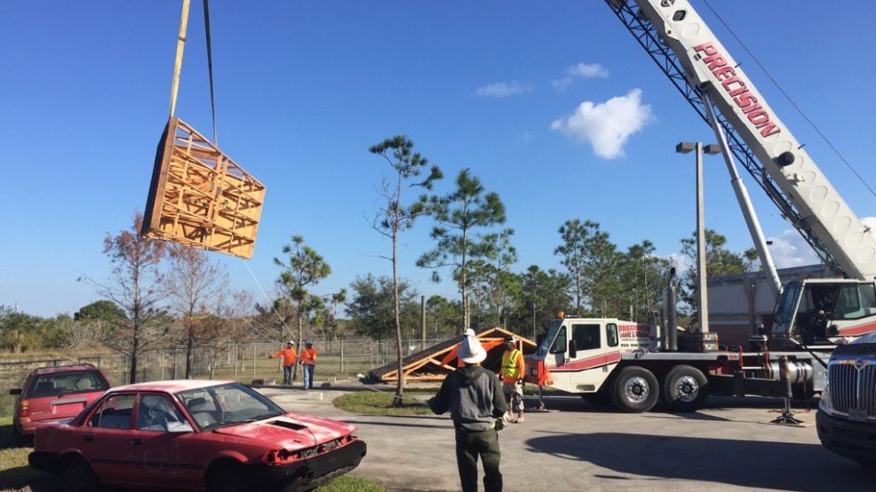 Students building home for family in Belle Glade WPEC